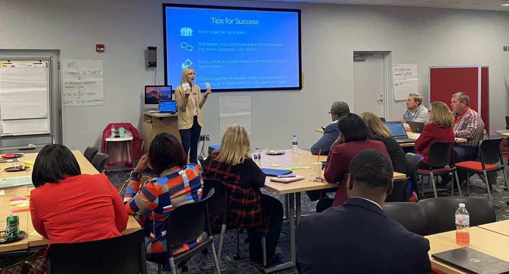 Image of Cirriculum Integration Coach Presenting to Room of School Administrators Image of Cirriculum Integration Coach Presenting to Room of School Administrators
