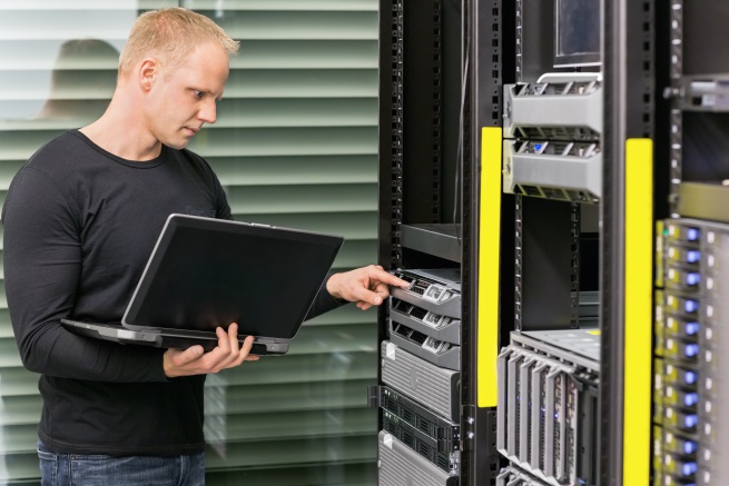 Image of Network Engineer Working on a Server