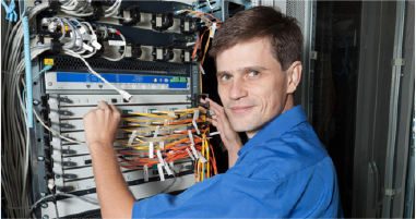 Image of Network Engineer Working on a Server