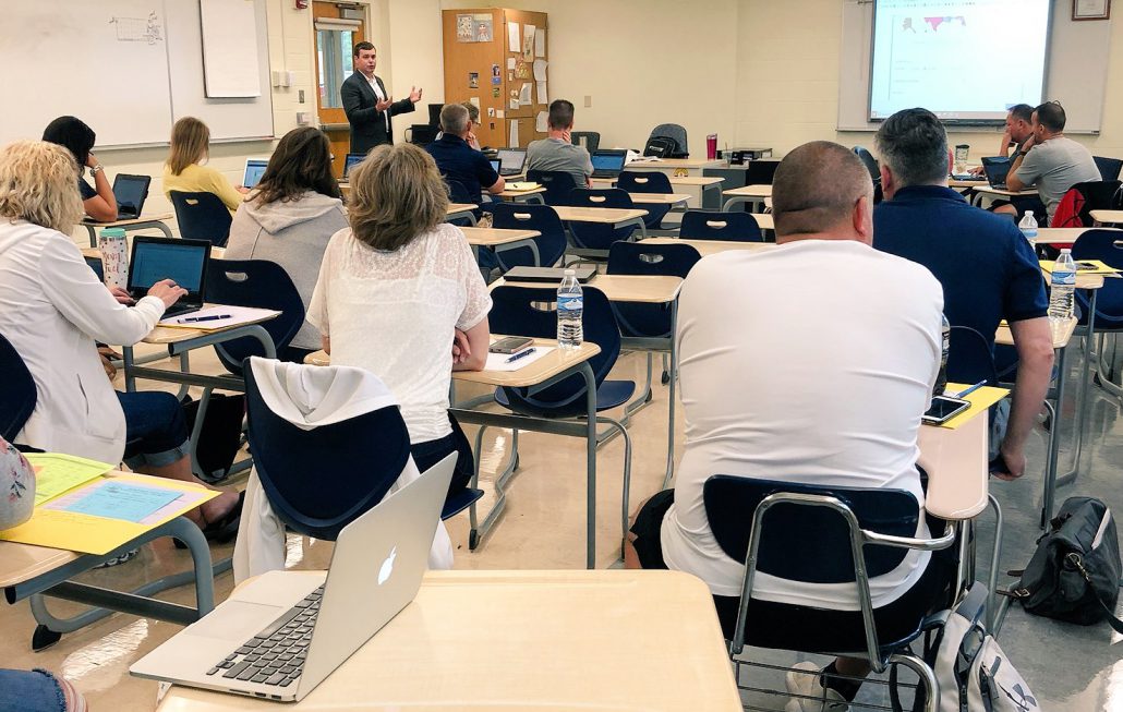 Image of Cirriculum Integration Coach Teaching a Classroom of Teachers