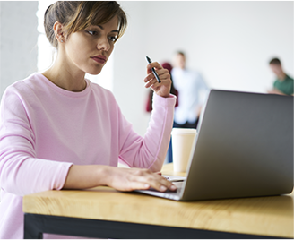 Image of Woman Working on Laptop