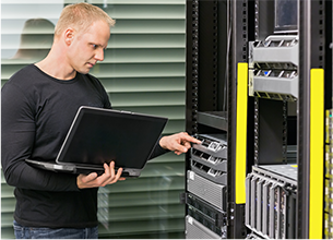 Image of Network Engineer Working on Server