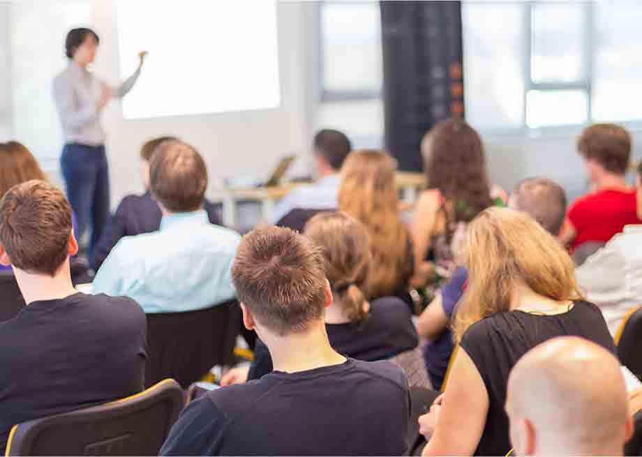 Image of College Professor Leturing Students Image of College Professor Leturing Students